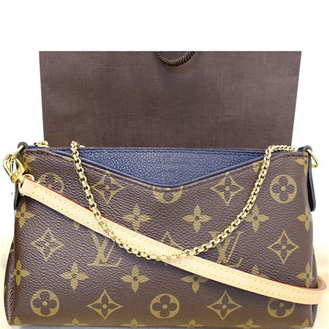 louis vuitton monogram pallas clutch.